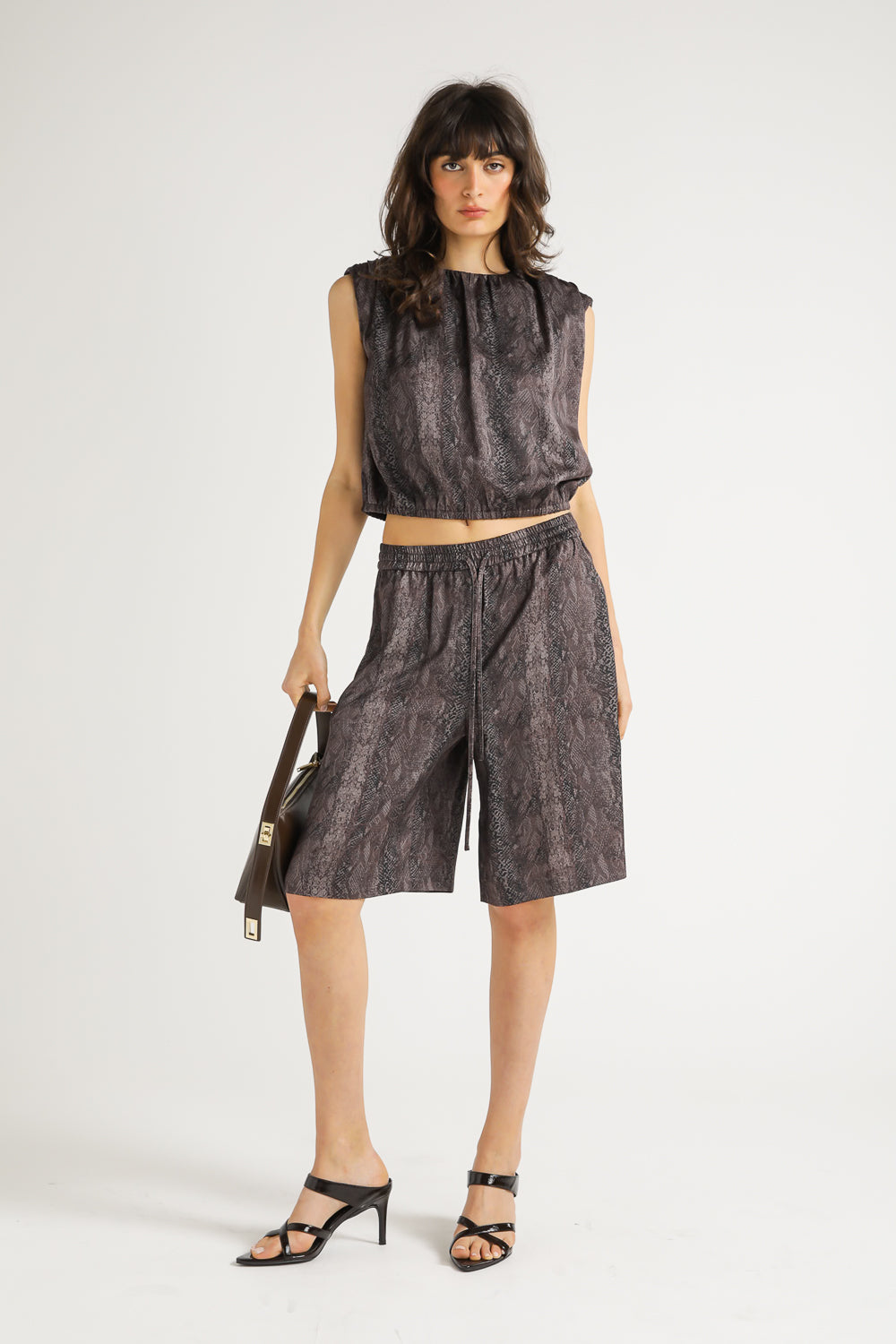 Snake Print Peplum Top